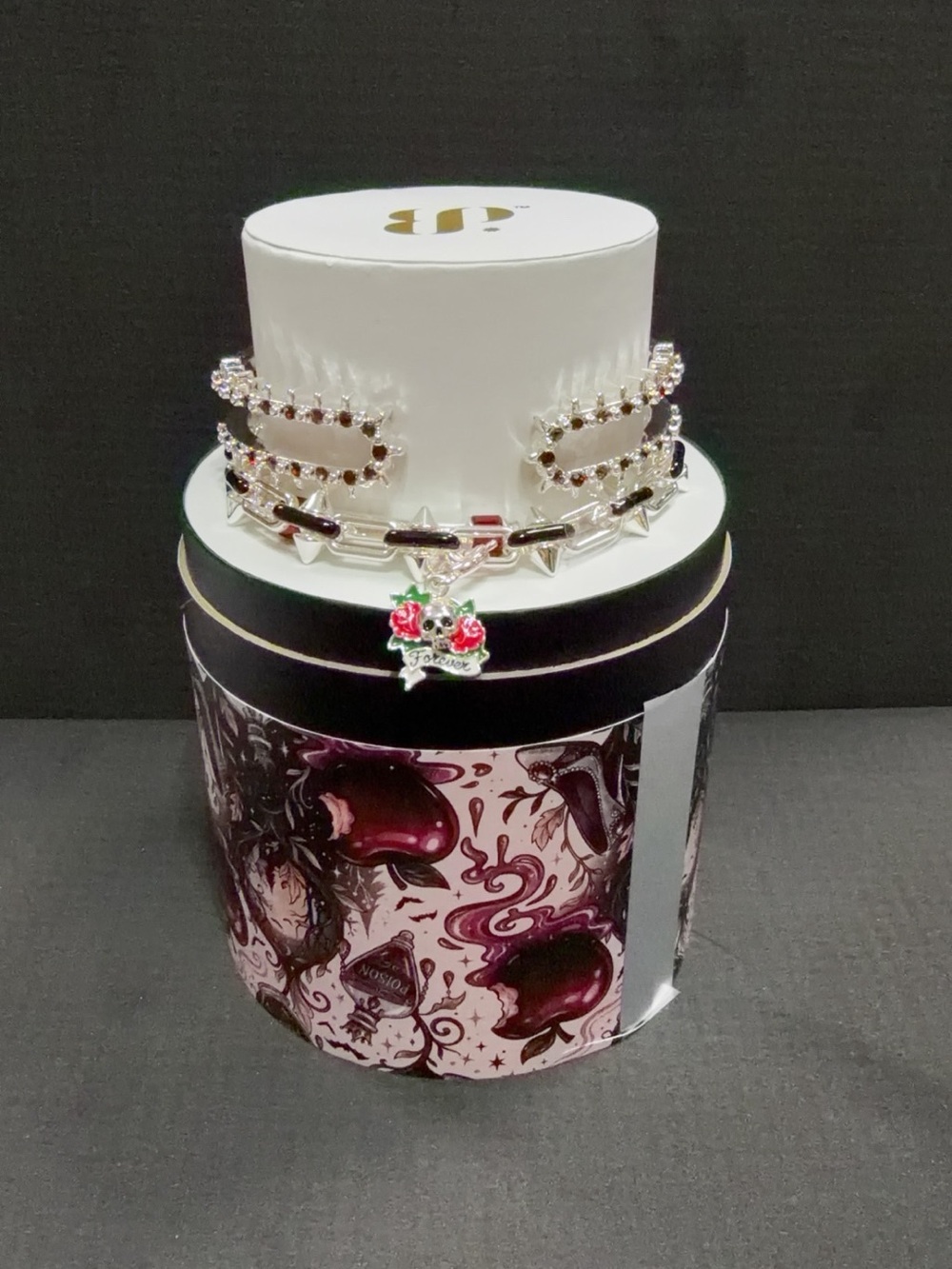 bp Silver-Tone Charm Bracelet with Pink Rose and Skull Accent